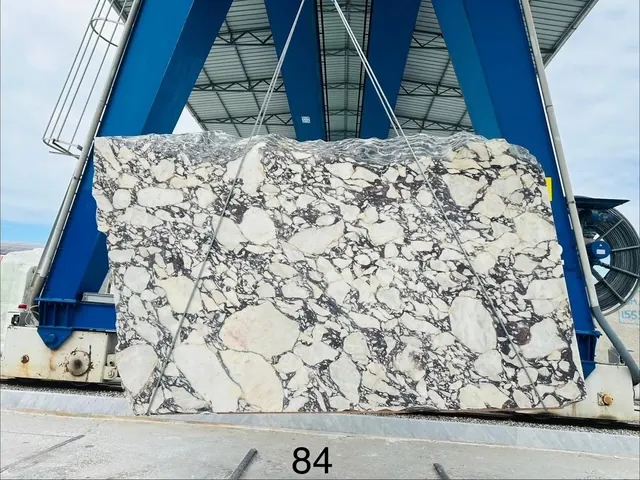 Viola marble block being prepared at an Italian quarry
